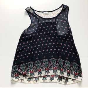 Sheer navy tank top with lace back detail. Size L